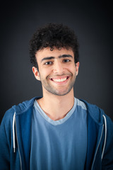Obraz premium Handsome man doing different expressions in different sets of clothes: smile