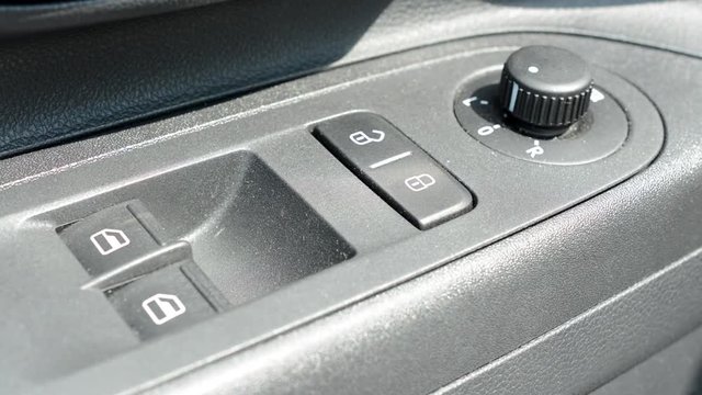 detail of control buttons panel inside the modern car