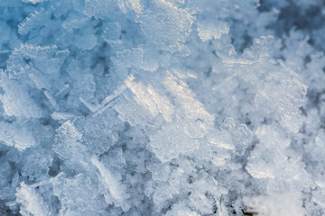 ice crystals with beautiful spikes cover ground in winter