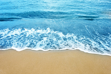Soft wave of ocean on the sandy beach
