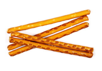 salty cracker pretzel sticks isolated on white background