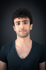 Obraz premium Handsome man doing different expressions in different sets of clothes: thinking