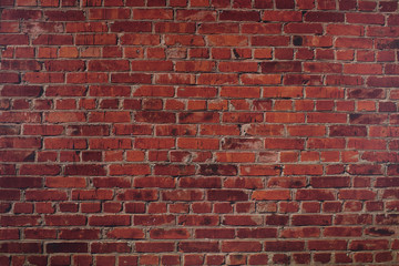 The wall of red brick. Background.