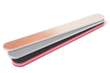 Three nail file with a different abrasive isolated on white background