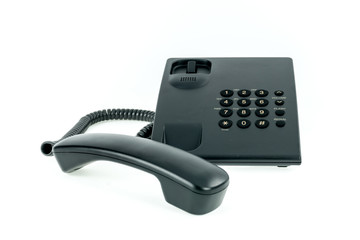 Black office phone with handset near isolated on the white background