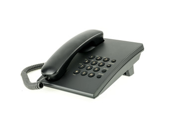 Black office phone with handset on-hook isolated on the white background