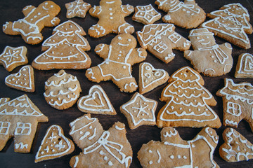 Christmas homemade gingerbread cookies on wooden table