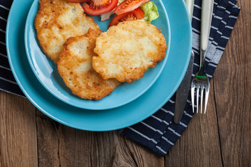 Crispy fried homemade potato pancakes.