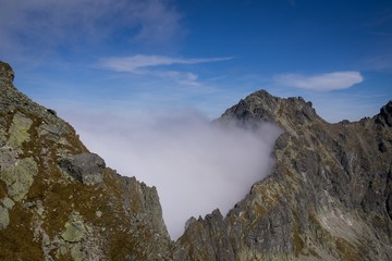 Fototapeta na wymiar Peaks and clouds in High Tatras. Slovakia