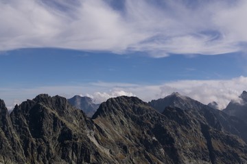 Fototapeta na wymiar Clouds and views of High Tatras Mountains. Slovakia