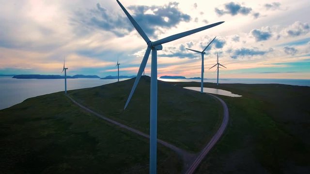 Windmills for electric power production. Arctic View Havoygavelen windmill park, Havoysund, Northern Norway Aerial footage.