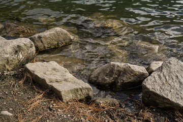 Stones in water of lake. Slovakia
