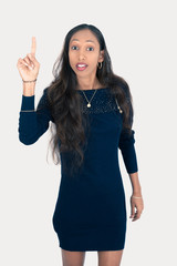 Obraz premium Beautiful woman doing different expressions in different sets of clothes: want to speak