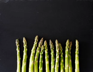 Poster Green asparagus on slate © 26max