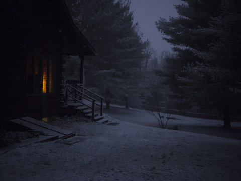 Fototapeta Cabin in snow covered forest