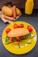 Hot Dog with mustard and ketchup. Top view. Close-up