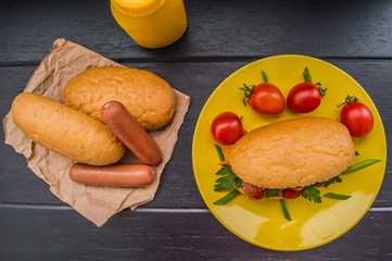 Hot Dog with mustard and ketchup. Top view. Close-up