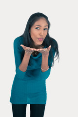 Naklejka premium Beautiful woman doing different expressions in different sets of clothes: kiss