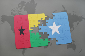 puzzle with the national flag of guinea bissau and somalia on a world map