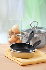 cooking equipment on wooden table