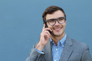 Businessman making a call outside