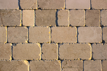 Fototapeta premium Pattern of grey and rough sandstone wall texture backgroun, natural surface.