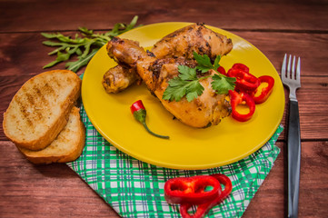 Fried chicken legs. Wooden rustic background