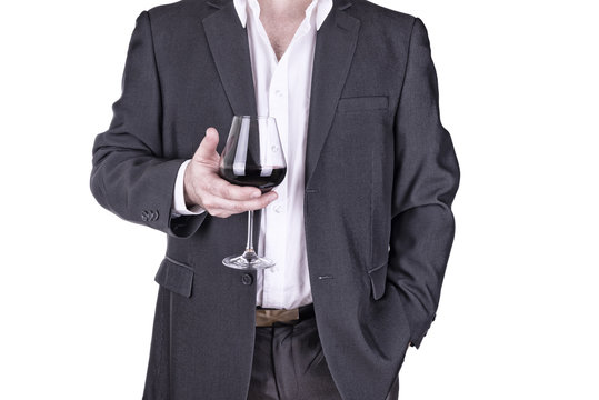 Close up on man holding glass of wine, isolated on white background.