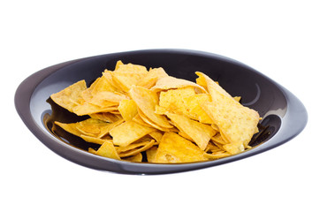 potato chips on a black plate on a white background