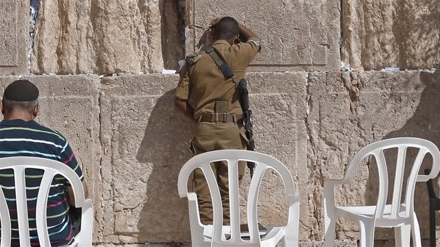 Israeli Soldier Praying At The Western Wall In Jerusalem Israel