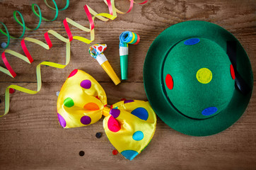 Fototapeta na wymiar clown hat and carnival accessories