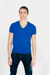 Obraz premium Handsome man doing different expressions in different sets of clothes: posing