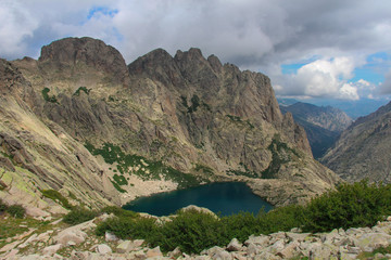 Obraz premium The Capitellu Lake from GR20 trail, Corse, France.