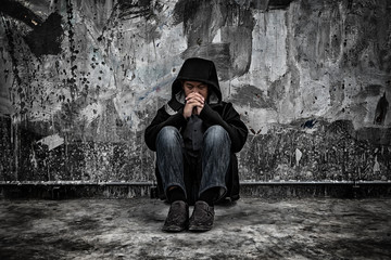 Drug abuse concept., overdose asian male drug addict with problems, man in hood with frustrated...