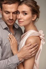 Love Relationship. Man Embracing Beautiful Smiling Woman