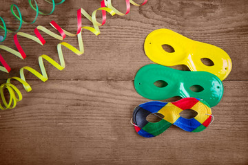 carnival masks on wood