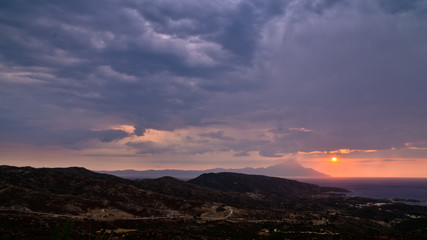 Stormy morning sunrise at holy mountain Athos, Macedonia, Greece