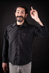 Naklejka premium Handsome man doing different expressions in different sets of clothes: idea