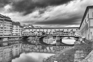 Fototapeta na wymiar Medieval Ponte Vecchio and the Arno River in Florence in Tuscany-Italy