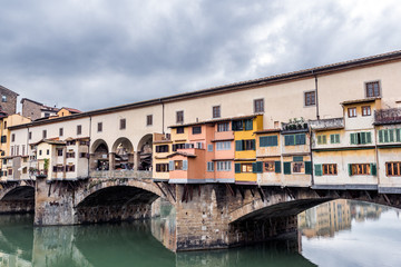 Fototapeta na wymiar Medieval Ponte Vecchio and the Arno River in Florence in Tuscany-Italy