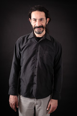 Fototapeta premium Handsome man doing different expressions in different sets of clothes: love