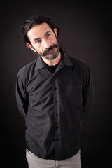 Handsome man doing different expressions in different sets of clothes: worried