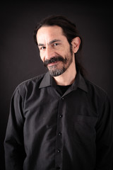 Handsome man doing different expressions in different sets of clothes: love