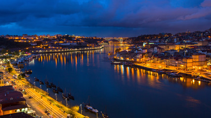 Fototapeta premium Douro river in the Porto old town at night, Portugal.
