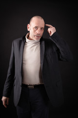 Handsome man doing different expressions in different sets of clothes: you are crazy