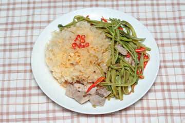Thai spicy fried snow fungus mushroom with morning glory.