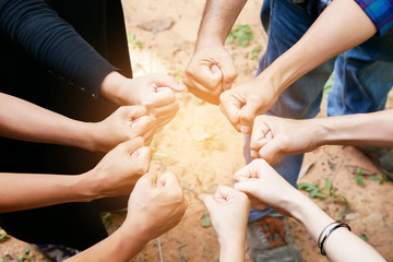 Posting stranglehold or wisp hand to the center of group of peop