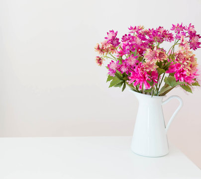 flowers in white vase