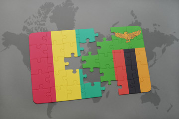 puzzle with the national flag of guinea and zambia on a world map