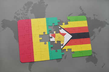 puzzle with the national flag of guinea and zimbabwe on a world map